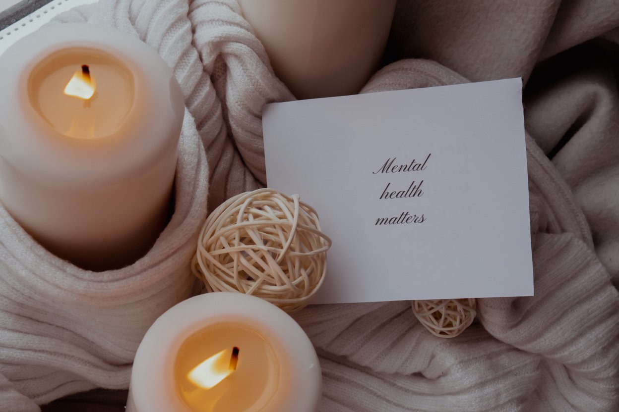 MENTAL HEALTH MATTERS text saying phrase on paper note on background of Home fragnance concept autumn holidays at cozy home. Still life of micro moment candid slow living. Mental health wellbeing exercises Raining Outside Hygge aesthetic